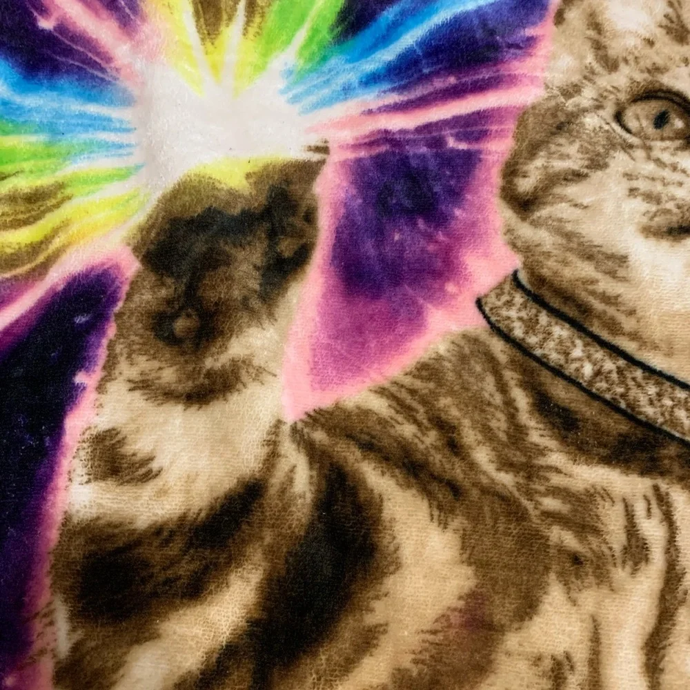Throw blanket with cat on it